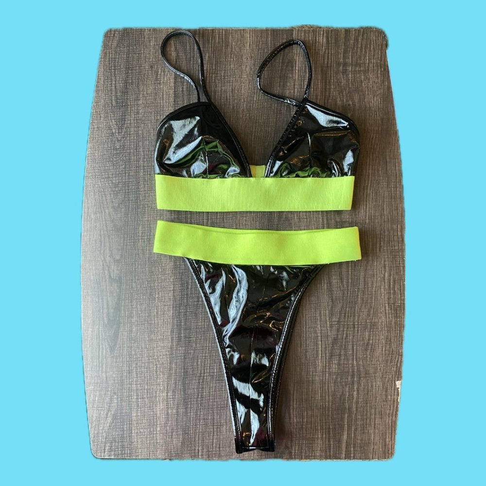 Black pleather and neon green two-piece